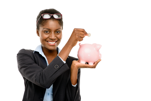 Happy African American business woman holdig piggybank isolated